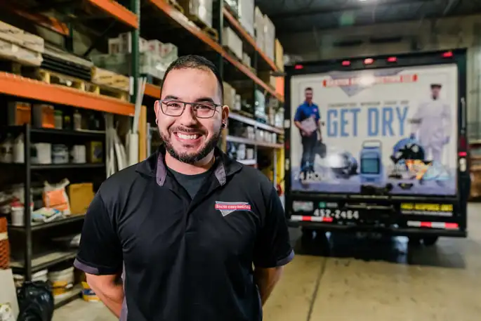 Portrait of Joel Nateras in the Baxter warehouse